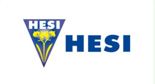 Logo von HESI mit Blumenmotiven und blauer Schrift auf weißem Hintergrund.